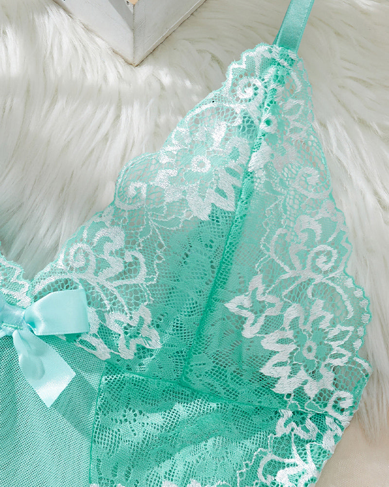 Mint green babydoll lingerie with white lace trim, low-rise design, perfect for sensual wear