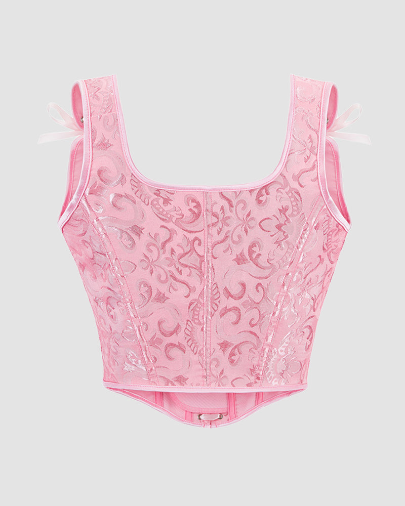 Pink floral 1950s corset with ribbon details, waist training design for parties and weddings.