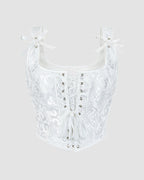 1950s white floral corset with lace-up front. Waist training design for parties and weddings.