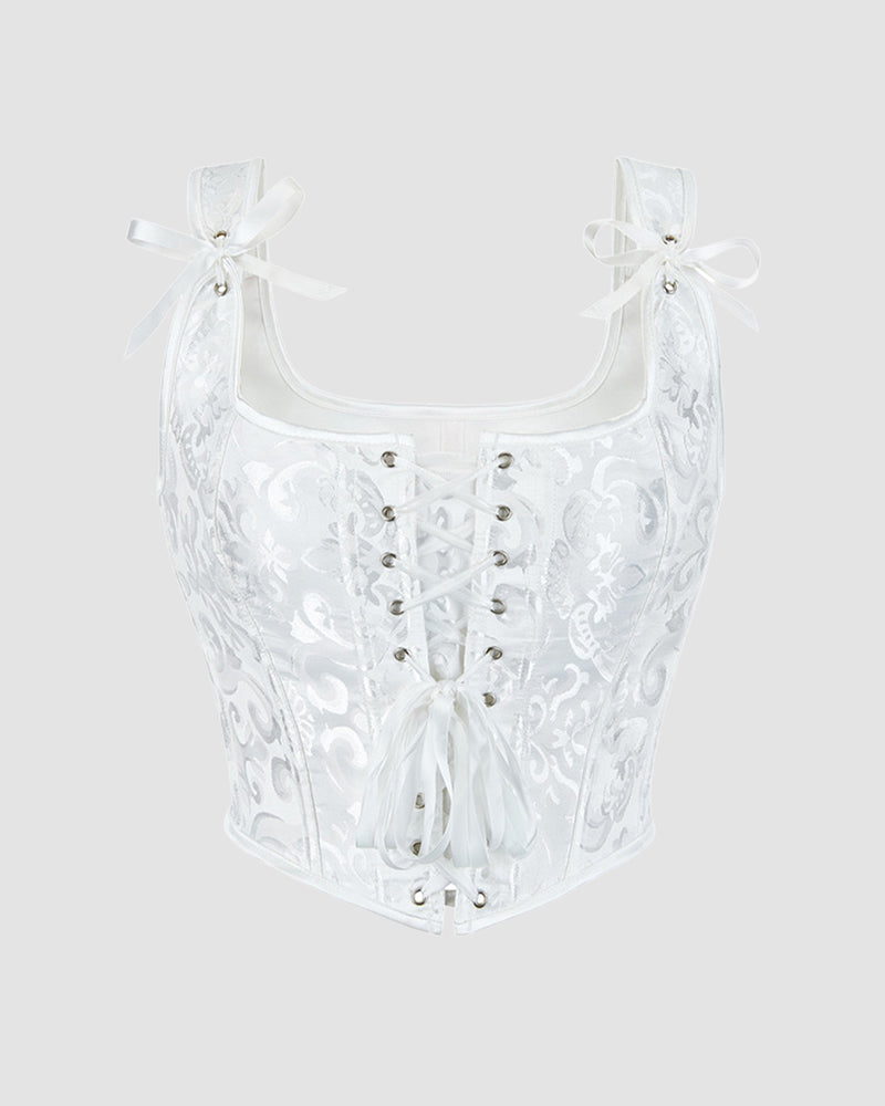 1950s white floral corset with lace-up front. Waist training design for parties and weddings.
