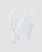 White 1950s floral corset with lace-up front. Waist training for parties and weddings.