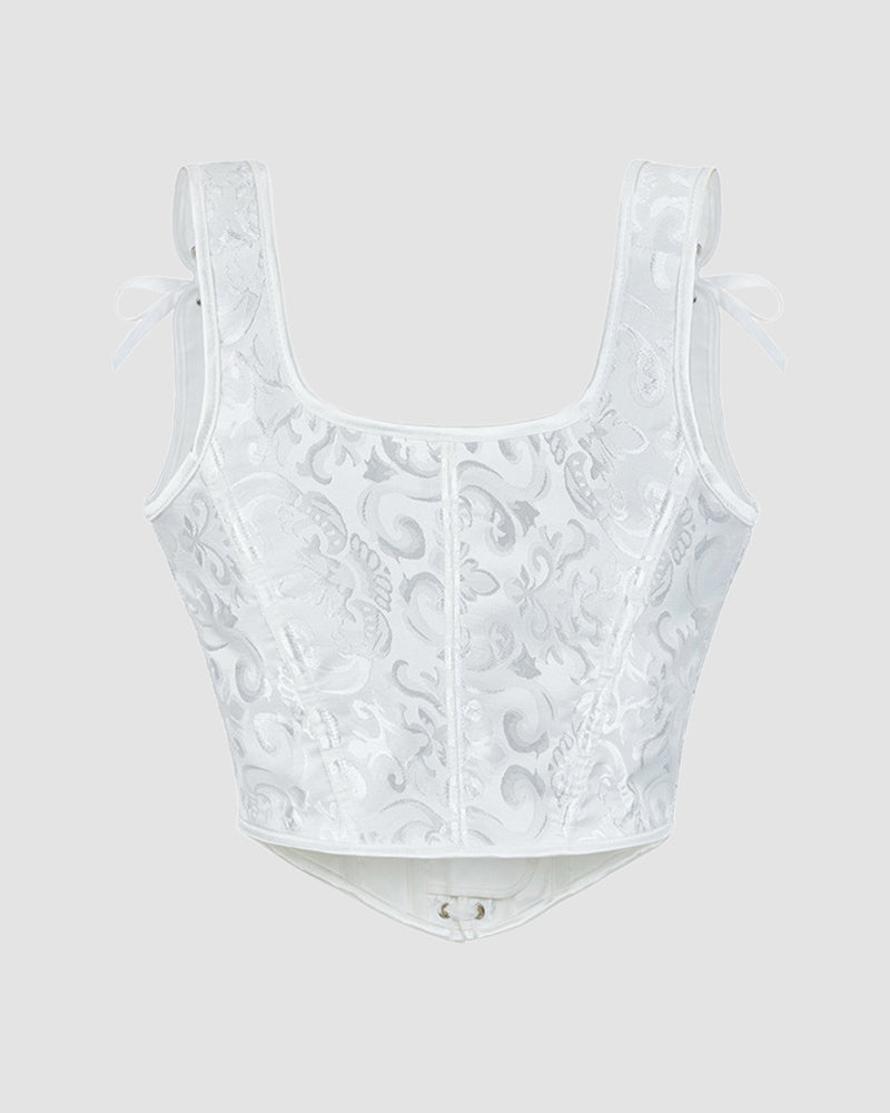 White 1950s floral corset with ribbon details, waist training design for parties and weddings.