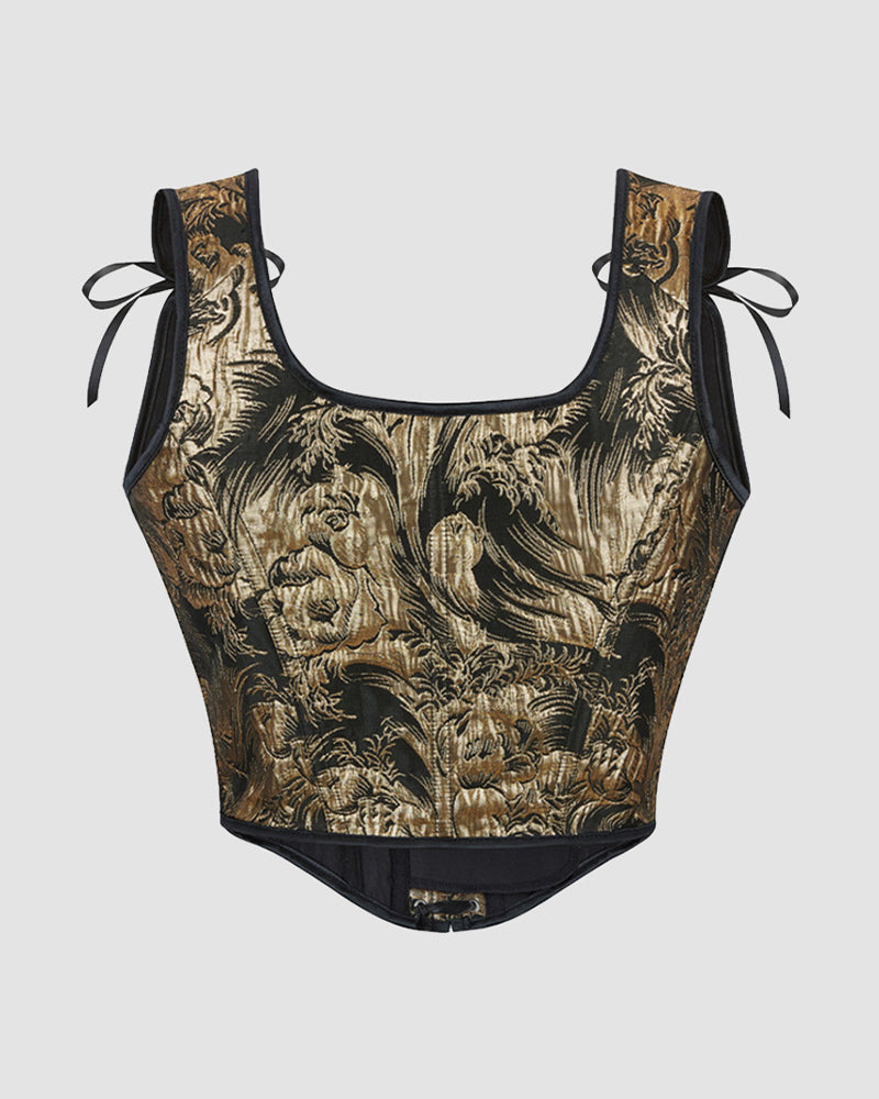 1950s golden corset with black straps and floral pattern, ideal for special occasions.